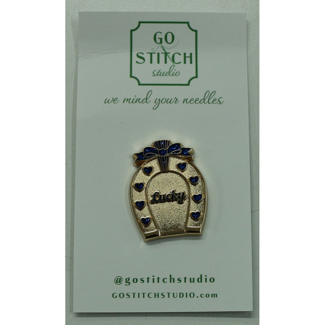 Sapphire Horseshoe Needle Minder
