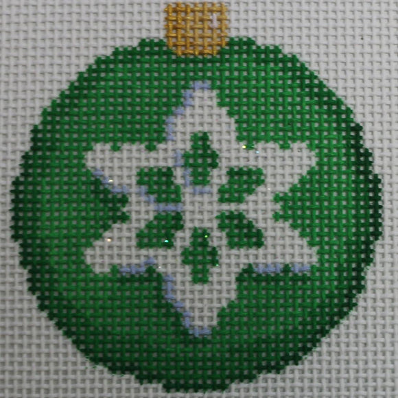White Snowflake on Green Round