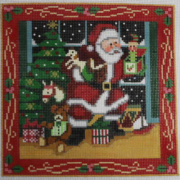 Santa in front of Tree & Toys