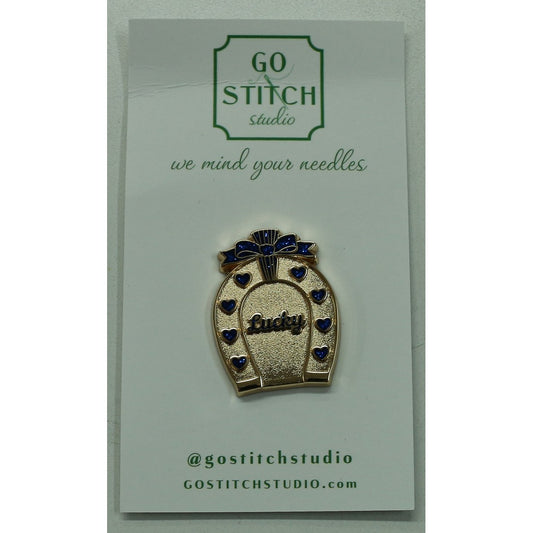 Sapphire Horseshoe Needle Minder