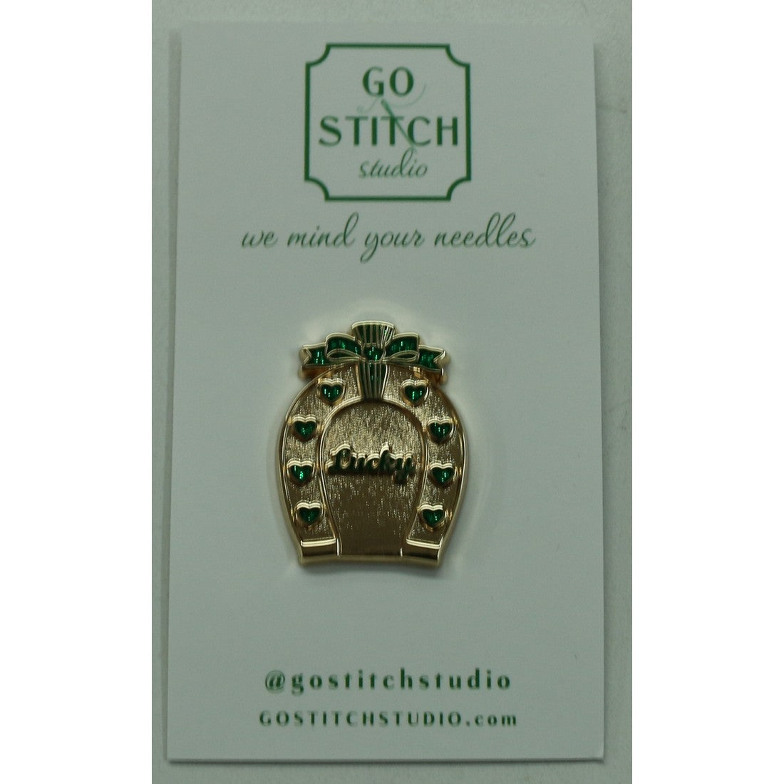 Emerald Horseshoe Needle Minder