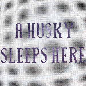 A Husky Sleeps Here