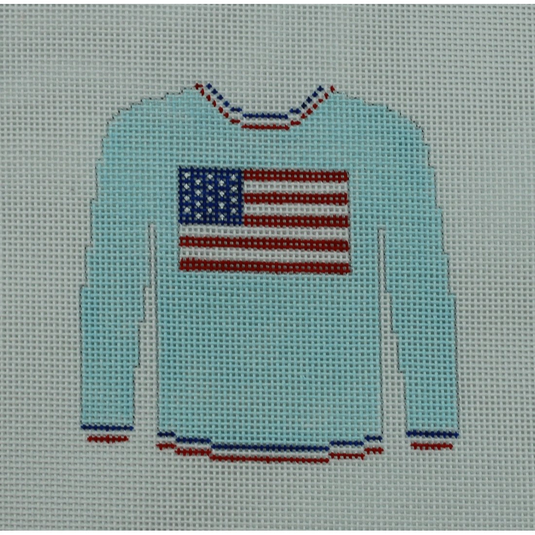 Flag on Light Blue Sweater