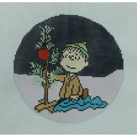 Linus Kneeling by Tree