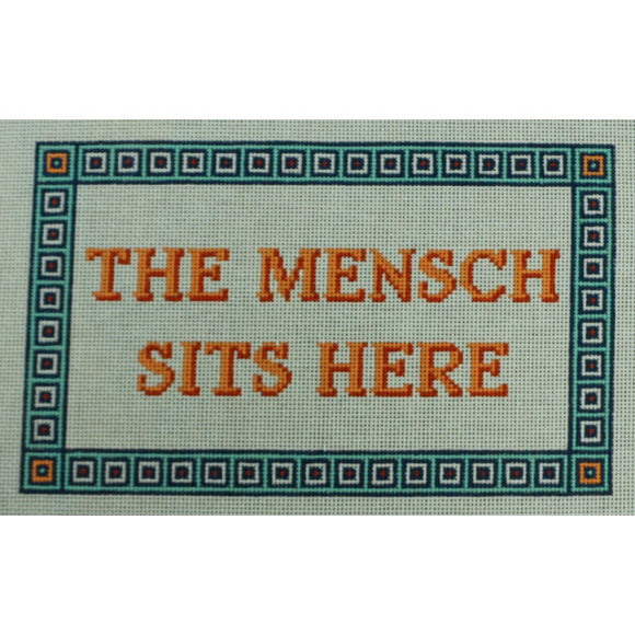 The Mensch Sits Here