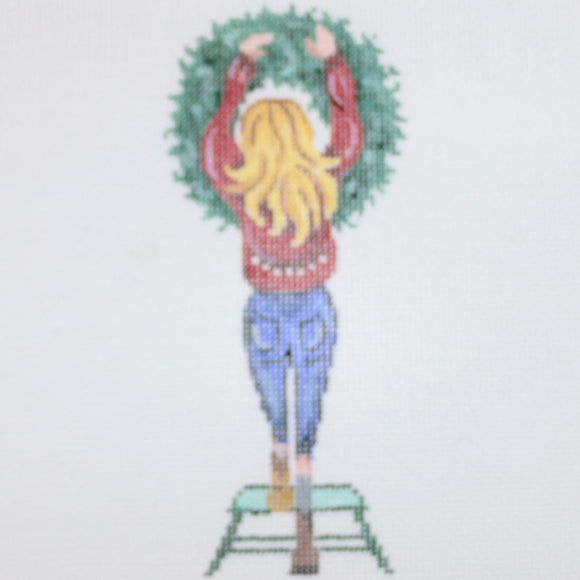 Girl Hanging Wreath